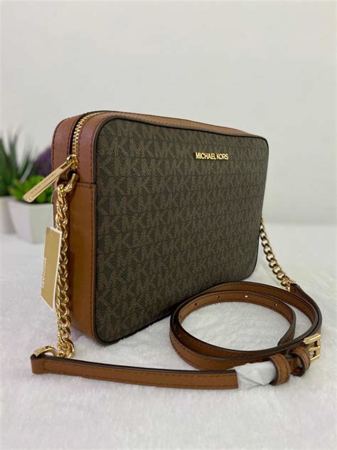 bolsas michael kors cros body precios